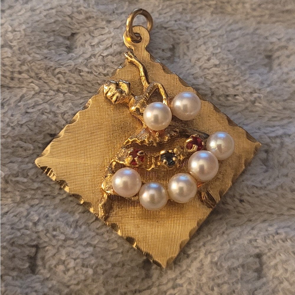 14k gold dancing pearl and natural gem stone ballerina pendant.